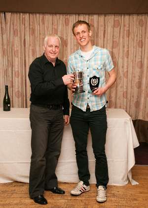 Liam Gutcher receiving the trophy for his 3rd Mens Northern Squash Club Championship